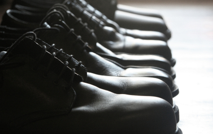 Black dress shoes for groomsmen at wedding.