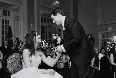 Groom singing to bride.