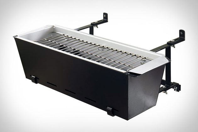 A BBQ grill that hangs on a balcony like a flowerpot.