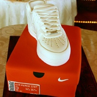 Grooms Cake - White Nike shoe on top of orange Nike box.