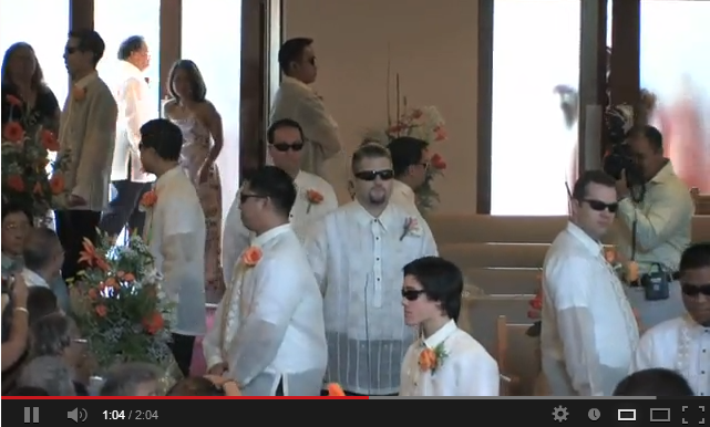 Image of groom and groomsmen at the ceremony.