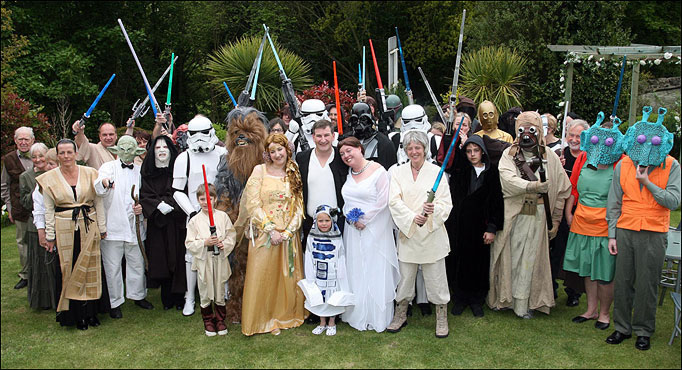 Wedding family photo with everyone dressed as a Star Wars character.