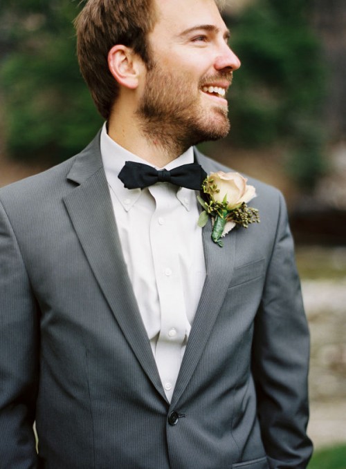 A groomsmen dressed for the wedding.